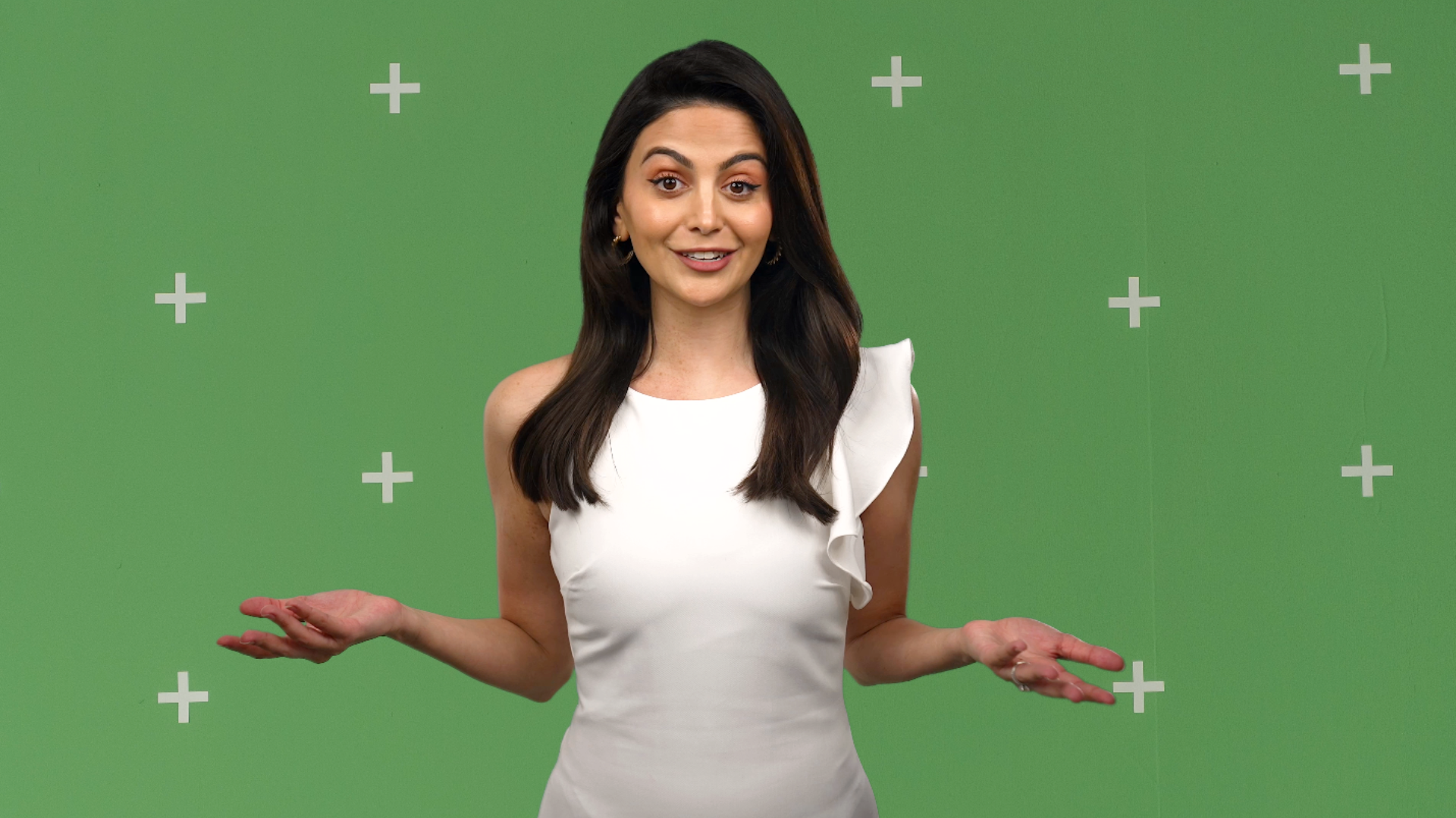 Dashti Media spokesperson Kezhal Dashti on a green screen background.